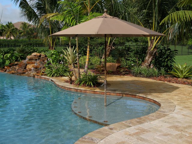 freeform pool with sun ledge south Florida